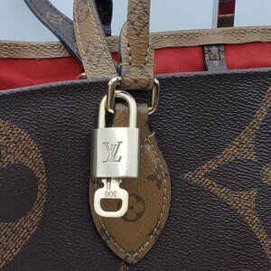 Authentic Louis Vuitton Gold Padlock In Excellent Shiny Brass 011526
